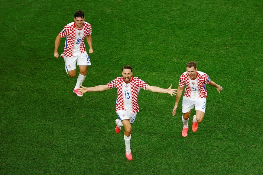 Soccer Football - FIFA World Cup 2026 - Group L - Croatia v Ghana - Philadelphia Stadium, Philadelphia, Pennsylvania, U.S. - June 27, 2026
Croatia's Nikola Vlasic celebrates scoring their second goal with Josip Stanisic and Martin Baturina REUTERS/Pilar Olivares     TPX IMAGES OF THE DAY