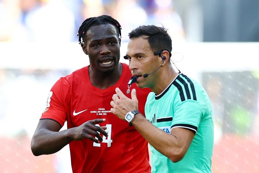 Soccer Football - FIFA World Cup 2026 - Group B - Canada v Bosnia and Herzegovina - Toronto Stadium, Toronto, Canada - June 12, 2026
Canada's Promise David reacts as referee Facundo Tello blows his whistle REUTERS/Bernadett Szabo