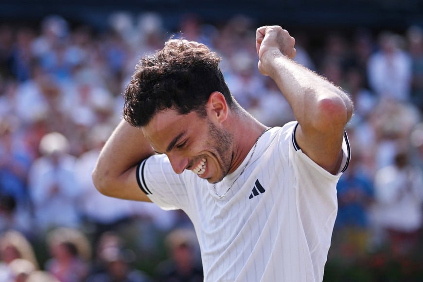 Tennis - Queen's Club Championships - Queen's Club, London, Britain - June 21, 2026
Argentina's Francisco Cerundolo celebrates after winning his final match against Tommy Paul of the U.S. REUTERS/Jaimi Joy