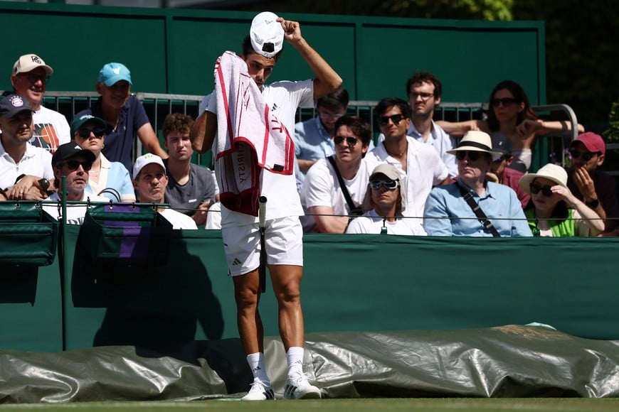 Tennis - Wimbledon - All England Lawn Tennis and Croquet Club, London, Britain - June 30, 2026
Argentina's Francisco Cerundolo during a break in play of his first round match against Spain's Jaume Munar REUTERS/Toby Melville