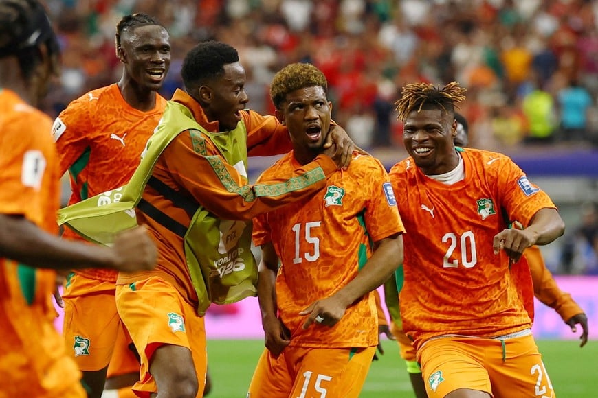 Soccer Football - FIFA World Cup 2026 - Round of 32 - Ivory Coast v Norway - Dallas Stadium, Arlington, Texas, U.S. - June 30, 2026
Ivory Coast's Amad Diallo celebrates scoring their first goal with teammates REUTERS/Kai Pfaffenbach TPX IMAGES OF THE DAY