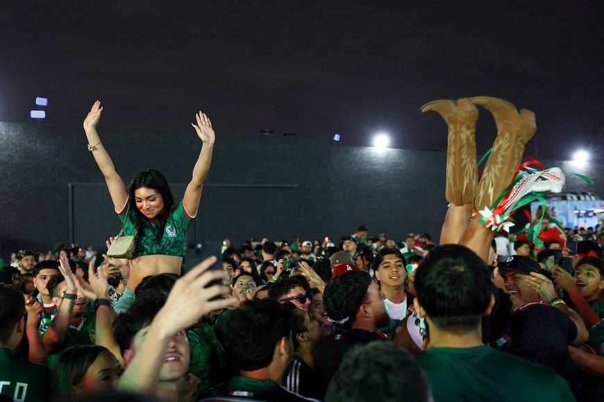 Soccer Football - FIFA World Cup 2026 - Round of 32 - Mexico v Ecuador - Fans gather in Los Angeles - Los Angeles, California, U.S. - June 30, 2026
Mexico fans celebrate at a watch party in Boyle Heights, Los Angeles during the match REUTERS/Lisi Niesner TPX IMAGES OF THE DAY
