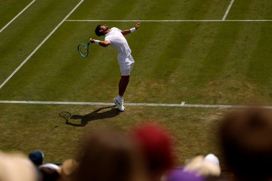 Tennis - Wimbledon - All England Lawn Tennis and Croquet Club, London, Britain - July 1, 2026
Argentina's Mariano Navone in action during his first round match against Italy's Flavio Cobolli REUTERS/Andrew Couldridge