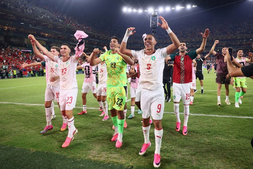 Soccer Football - FIFA World Cup 2026 - Round of 32 - Netherlands v Morocco - Estadio Monterrey, Monterrey, Mexico - June 29, 2026
Morocco's Soufiane Rahimi, Ahmed Reda Tagnaouti and teammates celebrate after the match as Morocco qualify for the Round of 16 stage of the World Cup REUTERS/Eloisa Sanchez TPX IMAGES OF THE DAY