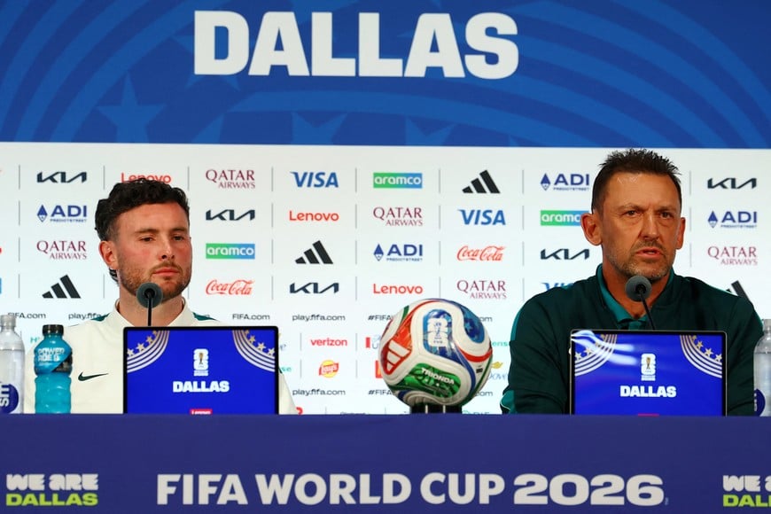 Soccer Football - FIFA World Cup 2026 - Australia Press Conference - Dallas Stadium, Arlington, Texas, U.S. - July 2, 2026
Australia coach Tony Popovic and Australia's Aiden O'Neill during the press conference REUTERS/Issei Kato