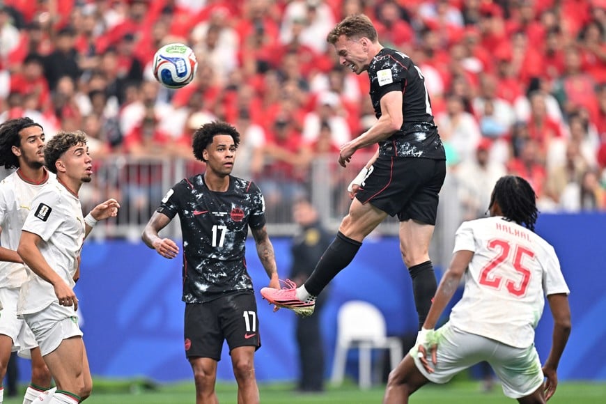 Soccer Football - FIFA World Cup 2026 - Round of 16 - Canada v Morocco - Houston Stadium, Houston, Texas, U.S. - July 4, 2026
Canada's Alistair Johnston heads at goal IMAGN IMAGES via Reuters/Maria Lysaker