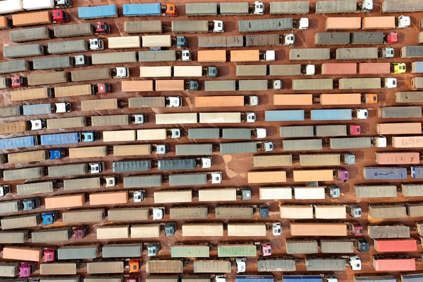 A drone view shows trucks loaded with soybeans waiting to unload at the port of Miritituba as heavy grain traffic in the region has led to long lines during Brazil's harvest shipping season, in Miritituba, Brazil, February 25, 2026. REUTERS/Adriano Machado

     TPX IMAGES OF THE DAY