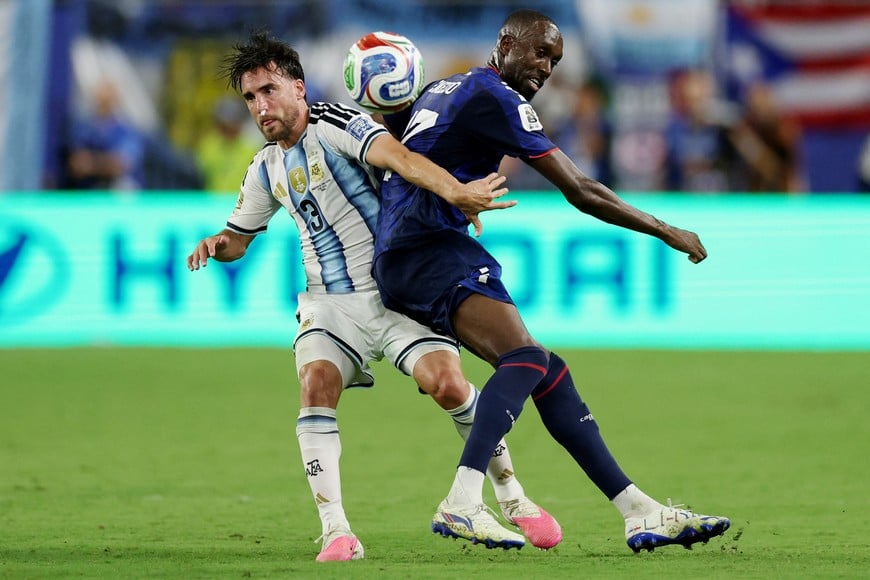 Soccer Football - FIFA World Cup 2026 - Round of 32 - Argentina v Cape Verde - Miami Stadium, Miami Gardens, Florida, U.S. - July 3, 2026
Argentina's Nicolas Tagliafico in action with Cape Verde's Willy Semedo REUTERS/Paul Childs