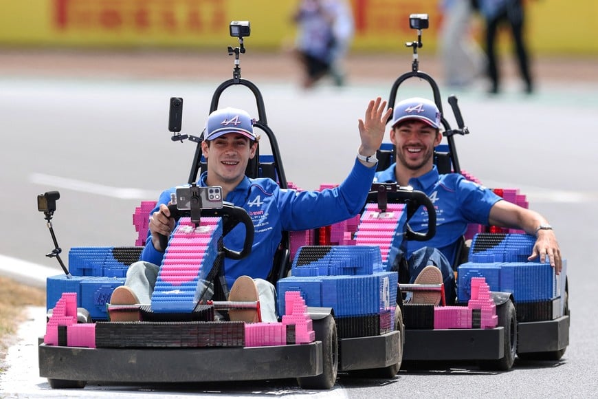 Formula One F1 - British Grand Prix - Silverstone Circuit, Silverstone, Britain - July 5, 2026
Alpine's Franco Colapinto and Alpine's Pierre Gasly in cars made of Lego blocks ahead of the race REUTERS/Andrew Boyers