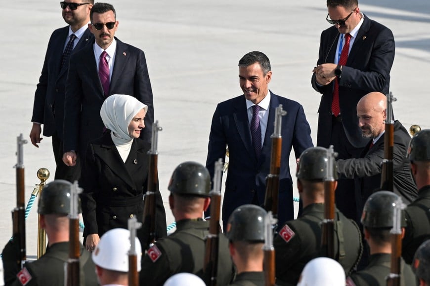 ANKARA, TURKIYE - JULY 7: Spanish Prime Minister Pedro Sanchez is welcomed by Turkish Minister of Family and Social Services Mahinur Ozdemir Goktas upon his arrival at Ankara Airport for the 36th NATO Heads of State and Government Summit in Ankara, Turkey, on July 7, 2026. Abdullah Guclu/Pool via REUTERS