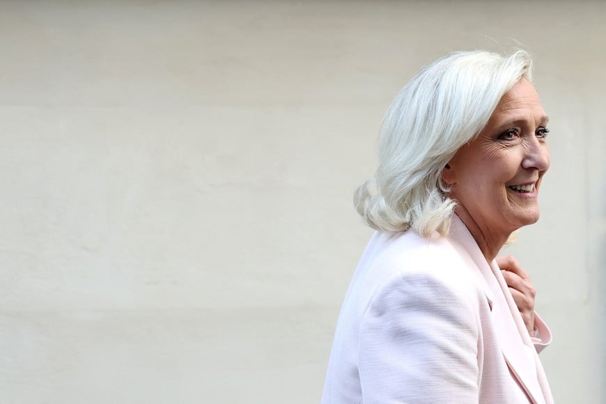 French far-right leader Marine Le Pen, member of parliament for the Rassemblement National (National Rally - RN) party, leaves after a party meeting at the Rassemblement National headquarters following the verdict in her appeal trial, alongside the RN party itself and 10 others defendants found guilty of diverting European Parliament funds, in Paris, France, July 7, 2026. REUTERS/Stephane Mahe