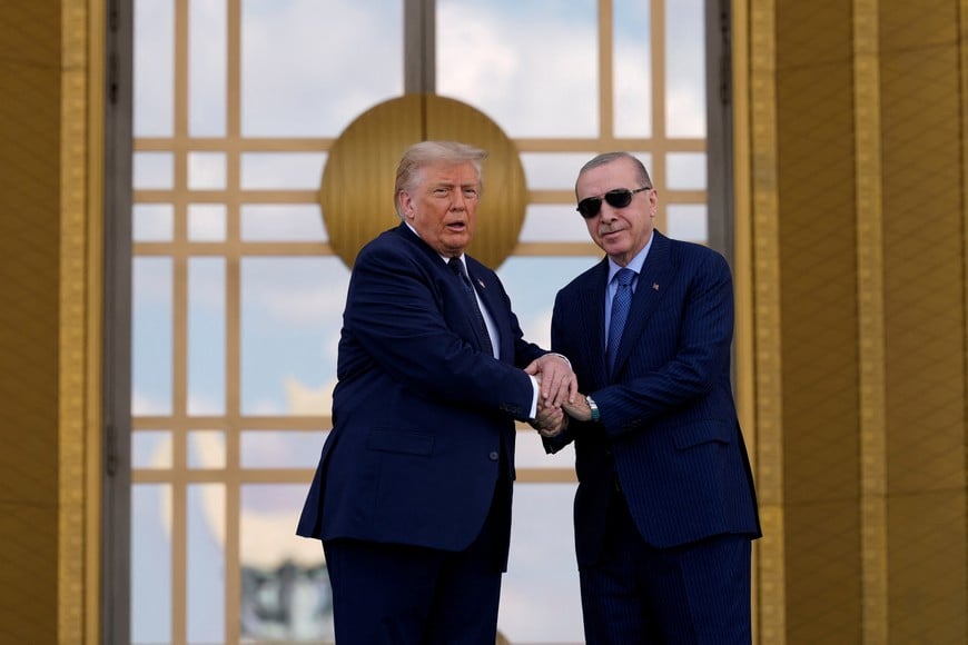 U.S. President Donald Trump shakes hands with Turkish President Recep Tayyip Erdogan as he arrives at the Bestepe Presidential Compound during a formal welcome for the NATO summit in Ankara, Turkey, Tuesday, July 7, 2026. Emrah Gurel/Pool via REUTERS