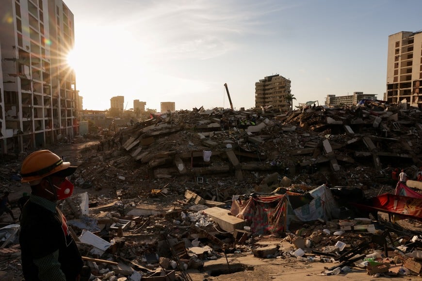 A man looks on, at the site of a collapsed building, in the aftermath of the June 24 earthquakes, in La Guaira, July 7, 2026. REUTERS/Gaby Oraa