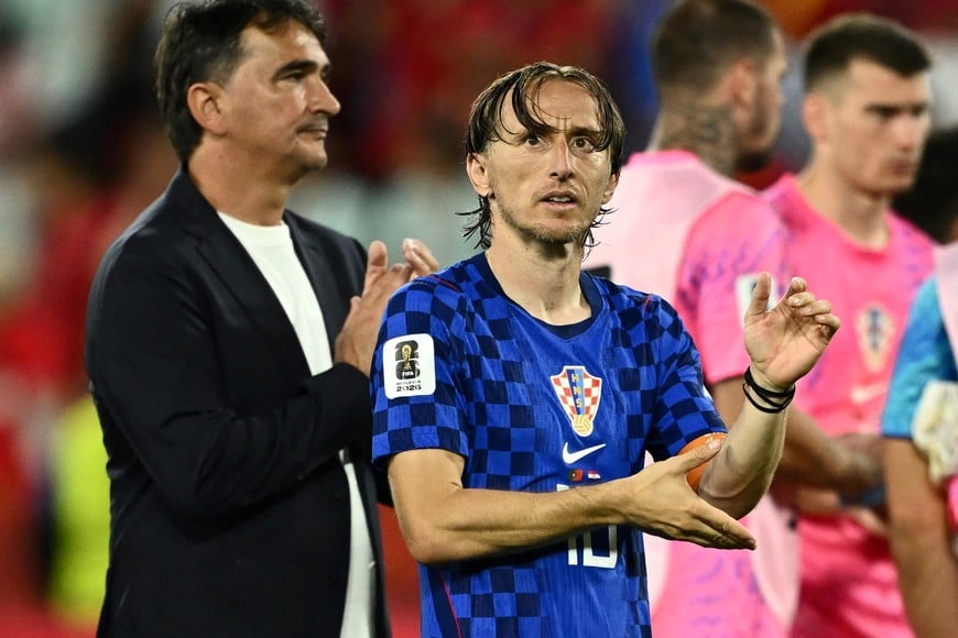 Soccer Football - FIFA World Cup 2026 - Round of 32 - Portugal v Croatia - Toronto Stadium, Toronto, Canada - July 2, 2026
Croatia's Luka Modric and coach Zlatko Dalic look dejected after the match as Croatia are eliminated from the World Cup REUTERS/Dylan Martinez