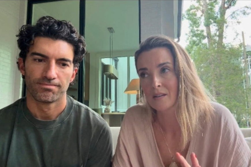 Actor Justin Baldoni reacts as his wife Emily Baldoni speaks in a video statement regarding his legal battle with actor Blake Lively, in an unknown location, in this screengrab obtained from a video released July 8, 2026. Justin Baldoni via Instagram/Handout via REUTERS THIS IMAGE HAS BEEN SUPPLIED BY A THIRD PARTY MANDATORY CREDIT NO RESALES. NO ARCHIVES