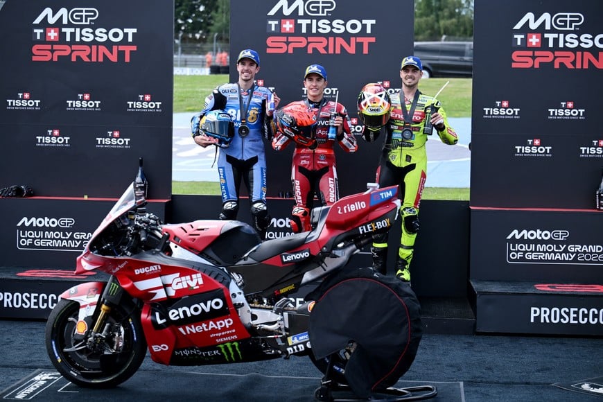 MotoGP - German Grand Prix - Sachsenring, Hohenstein-Ernstthal, Germany - July 11, 2026
Ducati Lenovo Team's Marc Marquez celebrates after winning the sprint race with runner up BK8 Gresini Racing MotoGP's Alex Marquez and third placed Pertamina Enduro VR46 Racing Team's Fabio Di Giannantonio REUTERS/Annegret Hilse