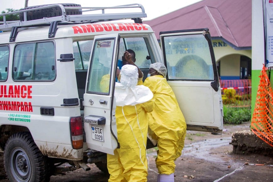 FILE PHOTO: Congolese health workers receive a patient at the Rwampara General Hospital as authorities intensify efforts to contain a new Ebola outbreak involving the Bundibugyo strain outbreak in Rwampara outside Bunia, Ituri province, Democratic Republic of Congo, May 21, 2026. REUTERS/Stringer//File Photo