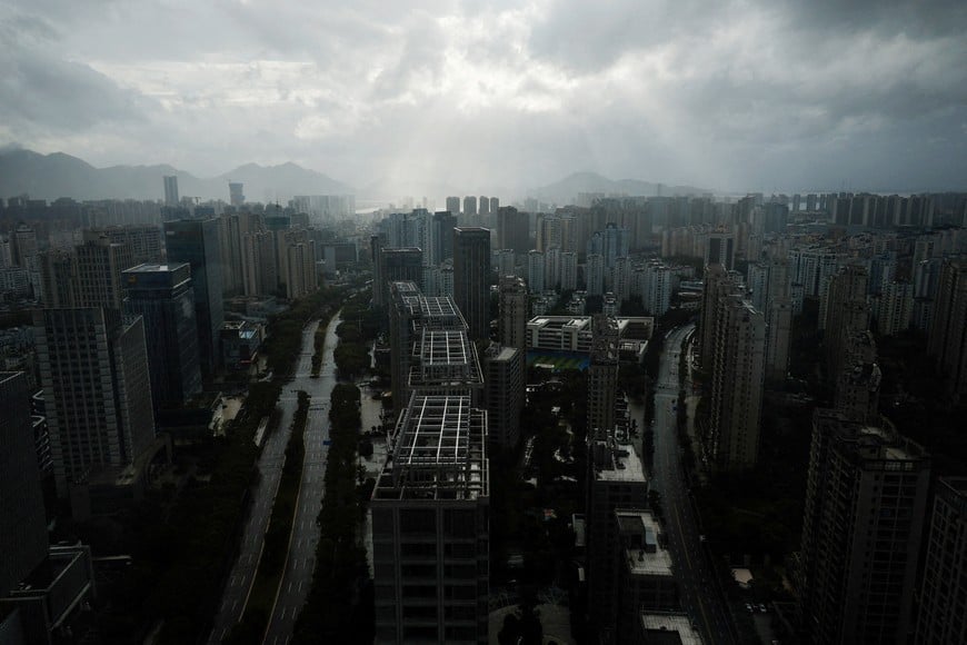 Rain clouds cover downtown as Typhoon Bavi approaches, in Wenzhou, Zhejiang province, China July 11, 2026. REUTERS/Go Nakamura TPX IMAGES OF THE DAY