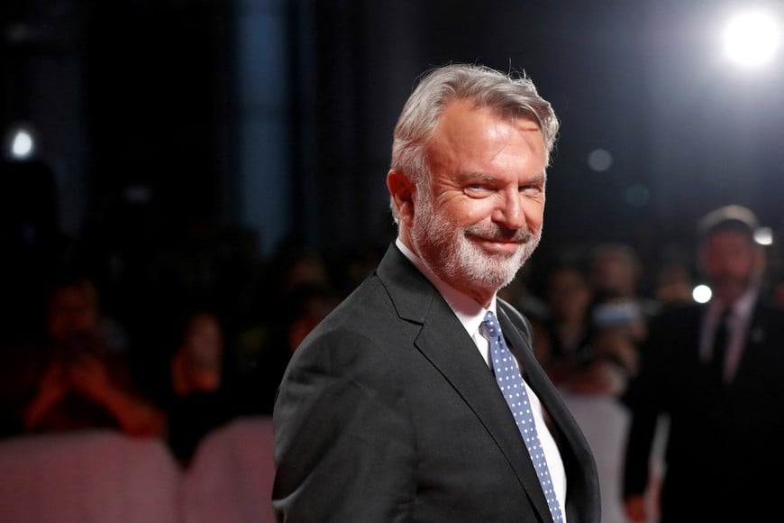 FILE PHOTO: Sam Neill arrives for a gala presentation of Blackbird at the Toronto International Film Festival (TIFF) in Toronto, Ontario, Canada September 6, 2019. REUTERS/Mario Anzuoni/File Photo