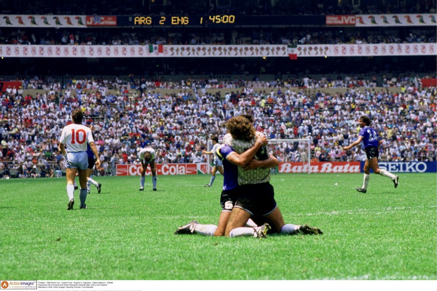 FILE PHOTO: Football - 1986 FIFA World Cup - Quarter Final - England v Argentina - Azteca Stadium, Mexico City - 22/6/86
Argentina's Nery Pumpido and Daniel Passarella celebrate after victory over England
Mandatory Credit: Action Images / Sporting Pictures / Tony Marshall
CONTRACT CLIENTS PLEASE NOTE: ADDITIONAL FEES MAY APPLY - PLEASE CONTACT YOUR ACCOUNT MANAGER/File Photo