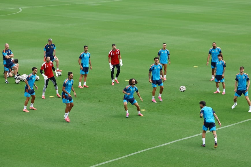 Soccer Football - FIFA World Cup 2026 - Spain Training - Cotton Bowl Stadium, Dallas, Texas, U.S. - July 13, 2026
Spain's Marc Cucurella with teammates during training REUTERS/Albert Gea