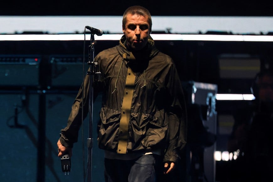 Liam Gallagher of Oasis performs, during the first of their sellout comeback shows, at the Cardiff Principality Stadium, in Cardiff, Wales, Britain, July 4, 2025. REUTERS/Suzanne Plunkett NO RESALES. NO ARCHIVES. NO USE AFTER 365 DAYS AFTER PUBLICATION. PHOTOGRAPHS MAY BE PUBLISHED IN CONTEXT WITH THE SHOW ONLY.