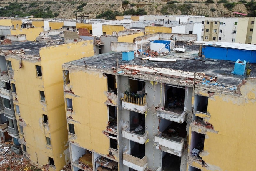A drone view shows damaged buildings in a Mision Vivienda housing complex, in Maiquetia, Venezuela, July 13, 2026. REUTERS/Leonardo Fernandez Viloria