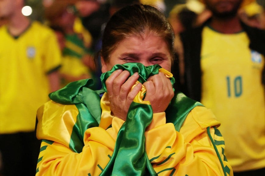 Soccer Football - FIFA World Cup 2026 - Round of 16 - Brazil v Norway - Fans gather in Sao Paulo - Sao Paulo, Brazil - July 5, 2026
Brazil fan looks dejected after the match in Sao Paulo as Brazil are eliminated from the World Cup REUTERS/Tuane Fernandes TPX IMAGES OF THE DAY