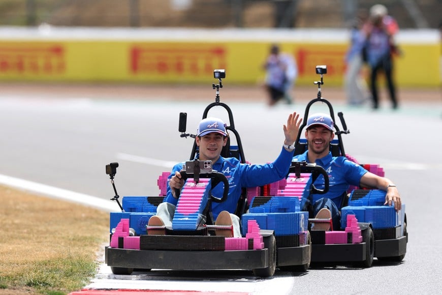 Formula One F1 - British Grand Prix - Silverstone Circuit, Silverstone, Britain - July 5, 2026
Alpine's Franco Colapinto and Alpine's Pierre Gasly in cars made of Lego blocks ahead of the race REUTERS/Andrew Boyers