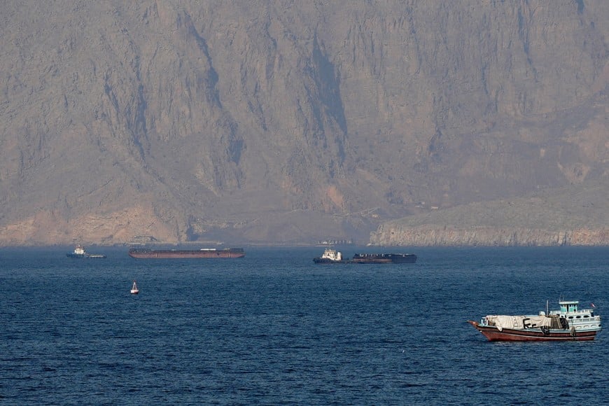 FILE PHOTO: Ships and tankers in the Strait of Hormuz off the coast of Musandam, Oman, April 18, 2026. REUTERS/Stringer//File Photo/File Photo