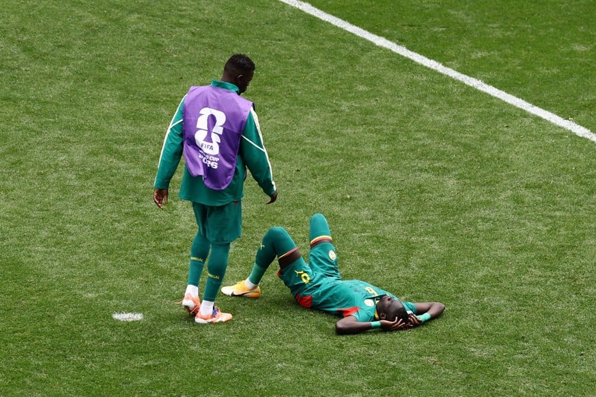 Soccer Football - FIFA World Cup 2026 - Round of 32 - Belgium v Senegal - Seattle Stadium, Seattle, Washington, U.S. - July 1, 2026
Senegal's Pathe Ciss looks dejected after the match as Senegal are eliminated from the World Cup REUTERS/Lee Smith
