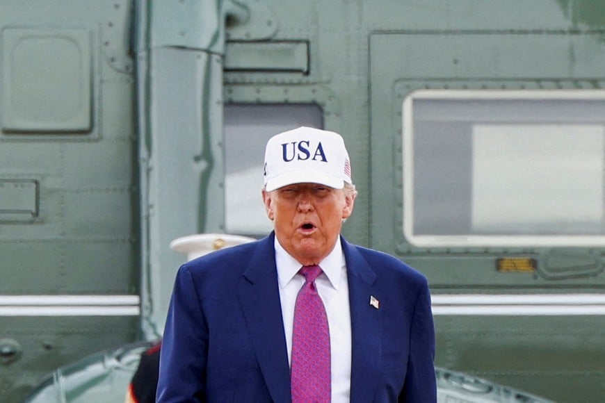 FILE PHOTO: U.S. President Donald Trump steps out of Marine One for a visit to Fort Bragg to mark the U.S. Army anniversary, in North Carolina, U.S., June 10, 2025. REUTERS/Evelyn Hockstein/File Photo