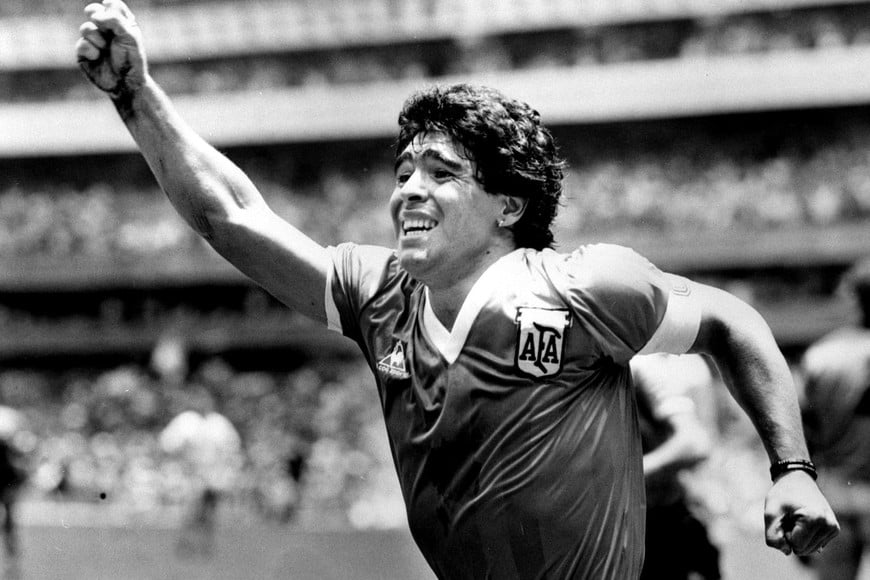 FILE PHOTO: Argentinian star Diego Maradona raises his arm in the air after scoring his game winning goal against England in their World Cup semi final in Mexico, June 22, 1986. REUTERS/Ted Blackbrow/Pool/File Photo IRELAND OUT. NO COMMERCIAL OR EDITORIAL SALES IN IRELAND. UNITED KINGDOM OUT. NO COMMERCIAL OR EDITORIAL SALES IN UNITED KINGDOM