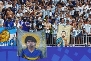 Soccer Football - FIFA World Cup 2026 - Semi Final - England v Argentina - Atlanta Stadium, Atlanta, Georgia, U.S. - July 15, 2026
Argentina fans display banners of Diego Maradona and Lionel Messi IMAGN IMAGES via Reuters/Nathan Ray Seebeck