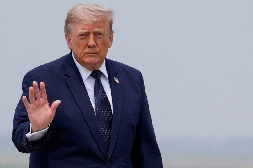 U.S. President Donald Trump gestures on the tarmac, as he heads to board the new Qatari-gifted Air Force One en route to New York City, at Joint Base Andrews, Maryland, U.S., July 17, 2026. REUTERS/Evan Vucci