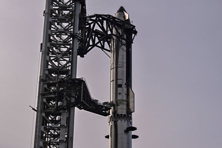 The SpaceX Starship sits atop the Super Heavy v3 Booster stand at pad 2 before its 13th test flight from the SpaceX launch complex in Starbase, Texas, U.S., July 16, 2026. REUTERS/Steve Nesius
