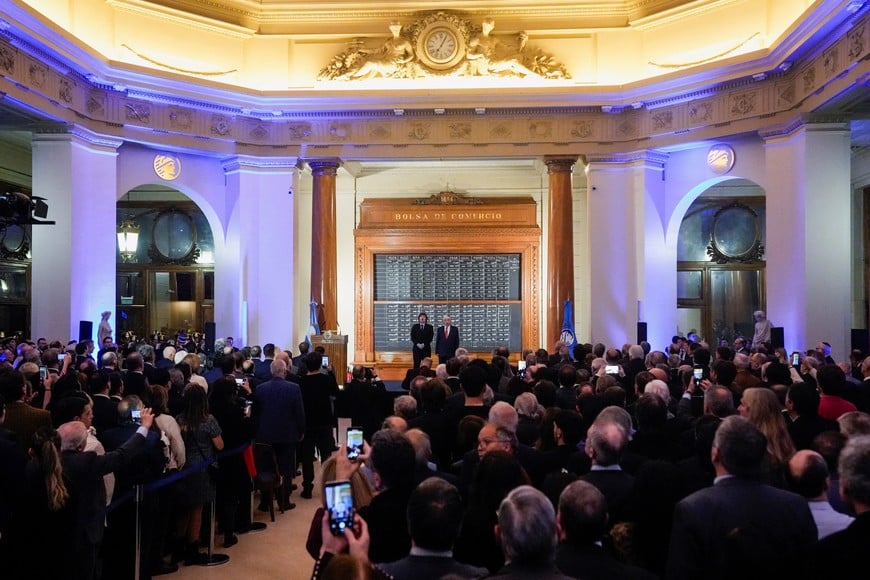 Argentine President Javier Milei and President of the Buenos Aires Stock Exchange Adelmo Gabbi sing the Argentine National Anthem during a ceremony commemorating the 172nd anniversary of the Buenos Aires Stock Exchange in Buenos Aires, Argentina, July 16, 2026. REUTERS/Mariana Nedelcu