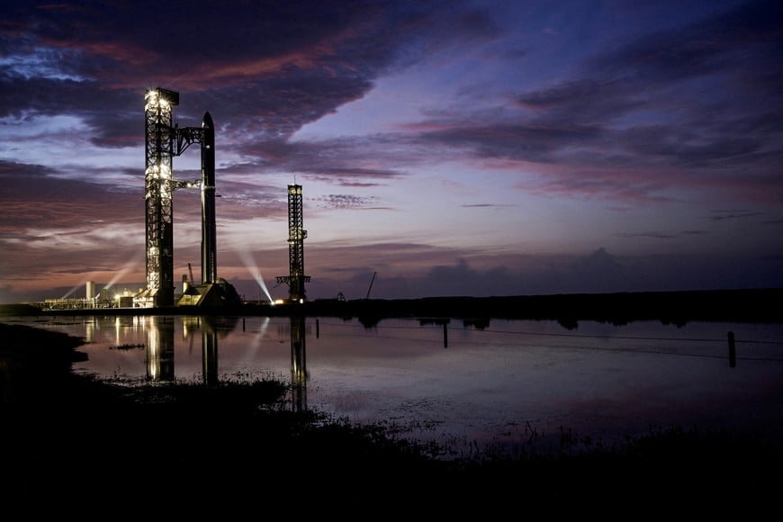 The SpaceX Starship and Super Heavy v3 Booster stand at pad 2 at sunrise before its 13th test flight from the SpaceX launch complex in Starbase, Texas, U.S., July 16, 2026. REUTERS/Steve Nesius TPX IMAGES OF THE DAY