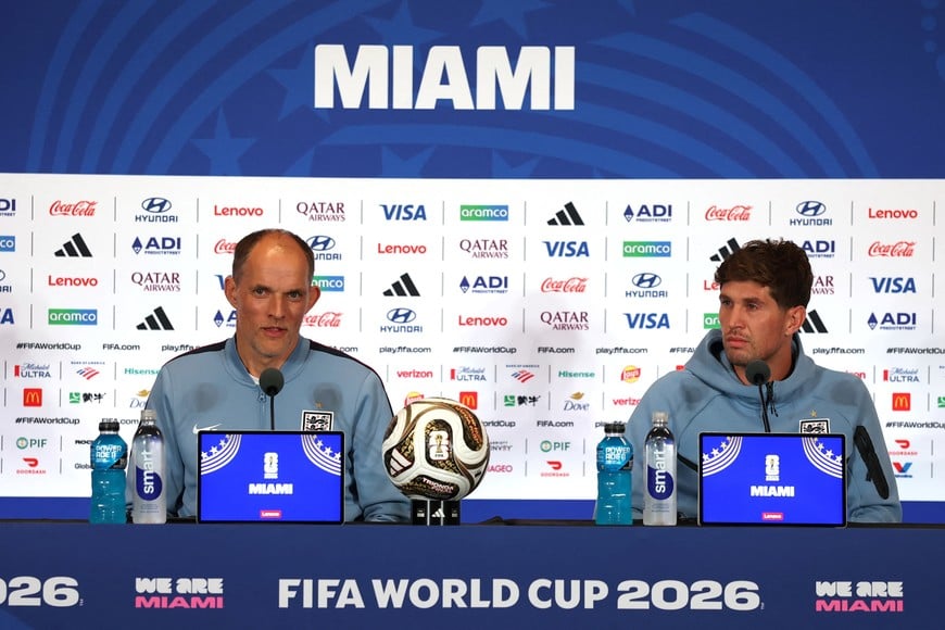 Soccer Football - FIFA World Cup 2026 - England Press Conference - Miami Stadium, Miami Gardens, Florida, U.S. - July 17, 2026
England manager Thomas Tuchel and England's John Stones during press conference REUTERS/Paul Childs