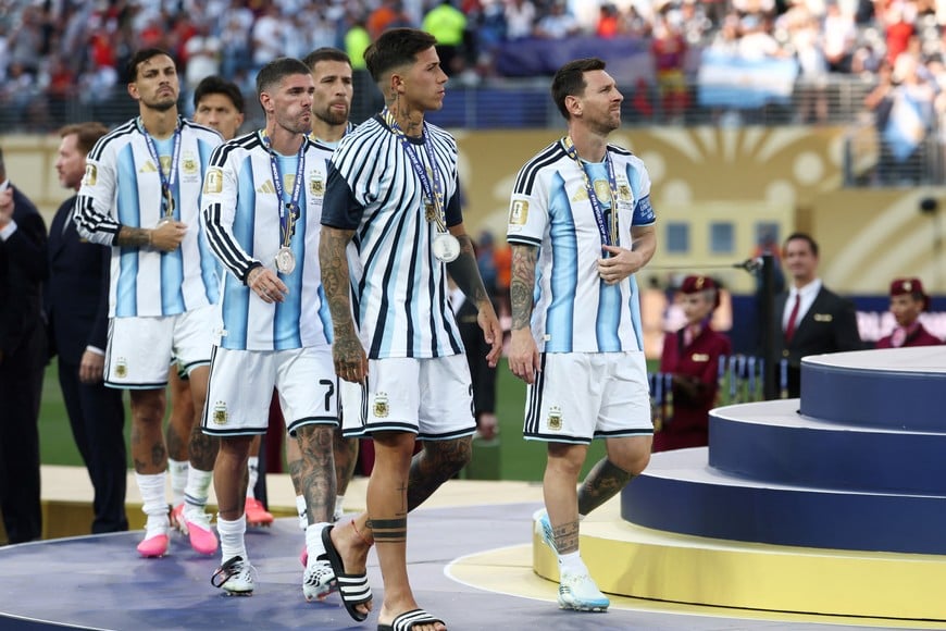 Soccer Football - FIFA World Cup 2026 - Final - Spain v Argentina - New York/New Jersey Stadium, East Rutherford, New Jersey, U.S. - July 19, 2026
Argentina's Lionel Messi, Enzo Fernandez, and Rodrigo De Paul look dejected after losing the World Cup final IMAGN IMAGES via Reuters/Mark J Rebilas