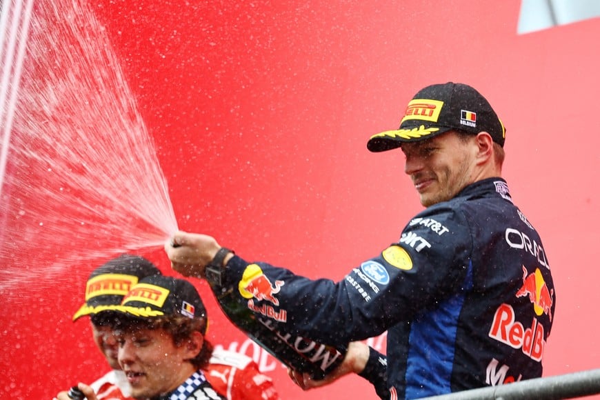 Formula One F1 - Belgian Grand Prix - Circuit de Spa-Francorchamps, Stavelot, Belgium - July 19, 2026
Red Bull's Max Verstappen celebrates with champagne on the podium after finishing third place in the Belgian Grand Prix REUTERS/Sarah Meyssonnier