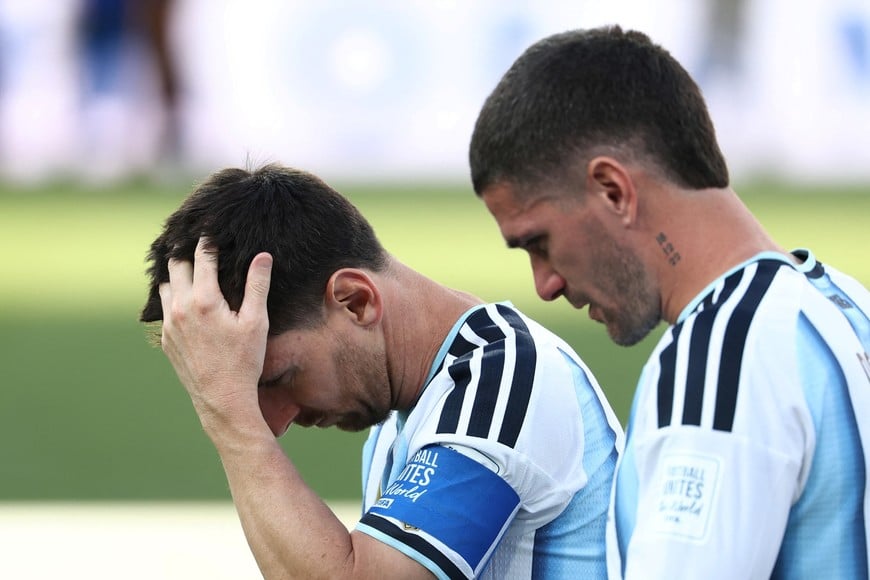 Soccer Football - FIFA World Cup 2026 - Final - Spain v Argentina - New York/New Jersey Stadium, East Rutherford, New Jersey, U.S. - July 19, 2026
Argentina's Lionel Messi and Rodrigo De Paul look dejected after losing the World Cup final IMAGN IMAGES via Reuters/Mark J Rebilas