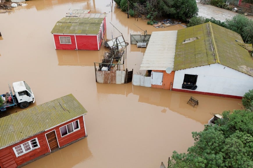 A drone view shows flooded houses after heavy rainfall from a weather front caused flooding and led the Chilean authorities to declare a state of emergency, in La Serena, Chile, July 20, 2026. REUTERS/Jorge Vega