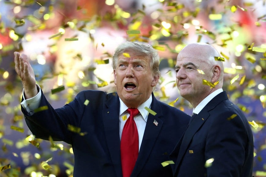Soccer Football - FIFA World Cup 2026 - Final - Spain v Argentina - New York/New Jersey Stadium, East Rutherford, New Jersey, U.S. - July 19, 2026
U.S. President Donald Trump and FIFA President Gianni Infantino during the trophy presentation after the match IMAGN IMAGES via Reuters/Mark J Rebilas TPX IMAGES OF THE DAY