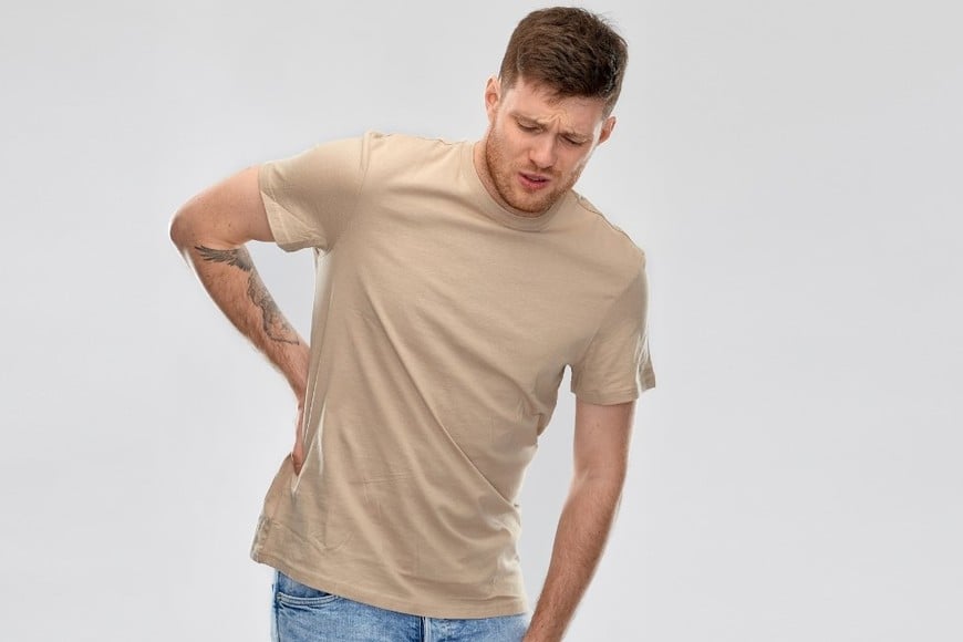 Una de las causas habituales del dolor lumbar es la sobrecarga muscular