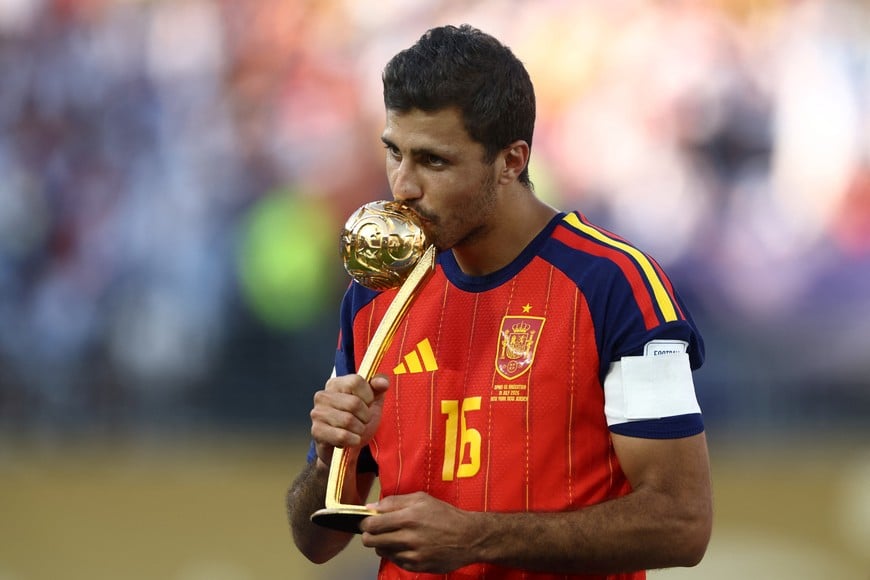 Soccer Football - FIFA World Cup 2026 - Final - Spain v Argentina - New York/New Jersey Stadium, East Rutherford, New Jersey, U.S. - July 19, 2026
Spain's Rodri celebrates after receiving the Golden Ball award REUTERS/Lee Smith