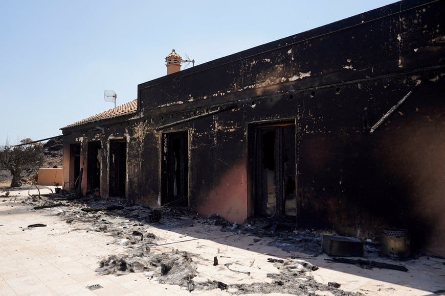 FILE PHOTO: A view of a burnt house at the aftermath of deadly wildfires in Bedar, Almeria, Spain July 13, 2026. REUTERS/Ana Beltran/File Photo