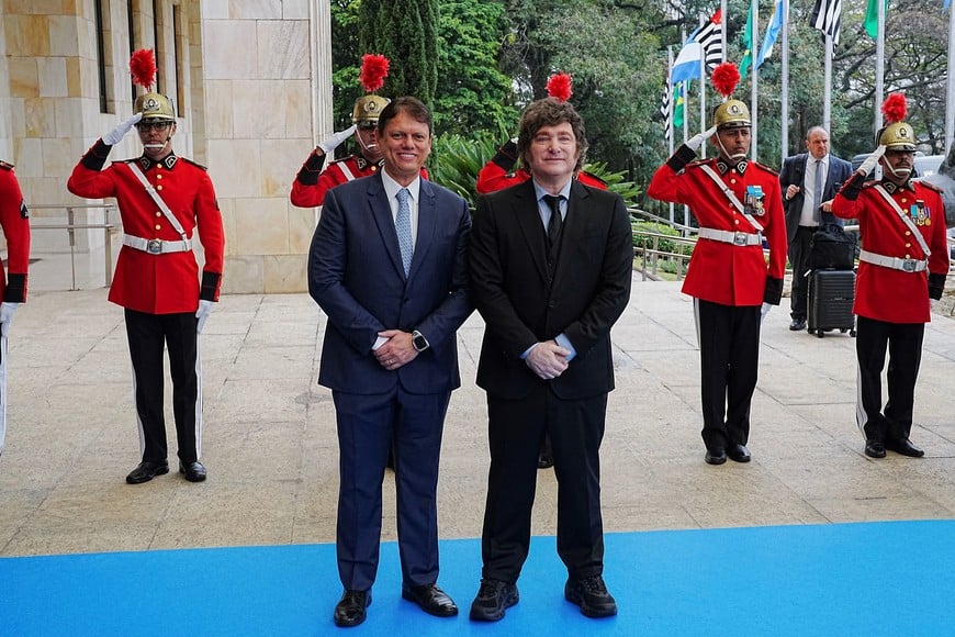 Argentine President Javier Milei is received by Sao Paulo's Governor Tarcisio de Freitas during an event at the Bandeirantes Palace in Sao Paulo, Brazil, July 25, 2026. REUTERS/Alexandre Meneghini