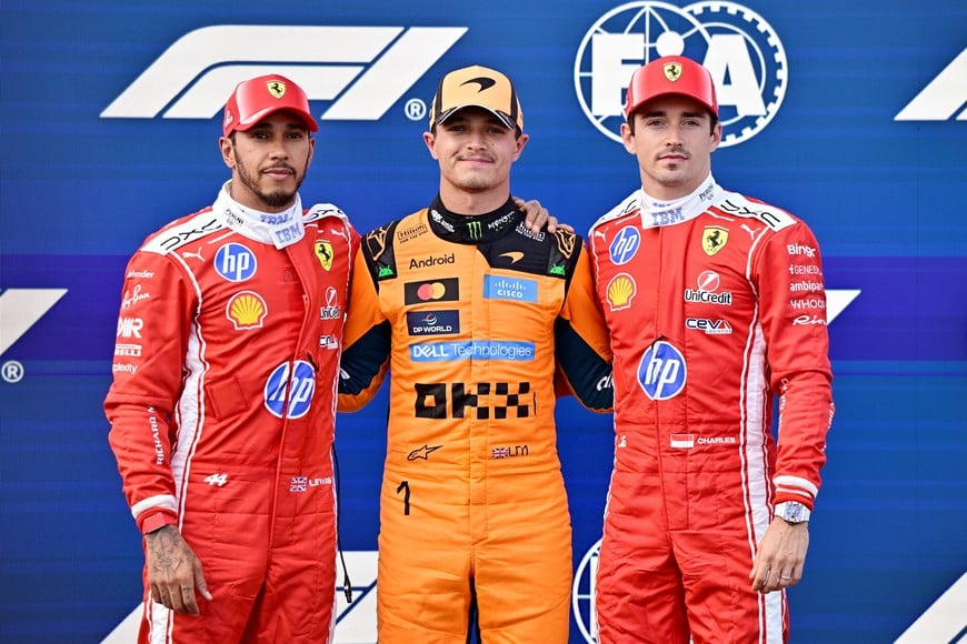 Formula One F1 - Hungarian Grand Prix - Hungaroring, Budapest, Hungary - July 25, 2026
McLaren's Lando Norris celebrates after qualifying in pole position, with second placed Ferrari's Lewis Hamilton and third placed Ferrari's Charles Leclerc REUTERS/Marton Monus