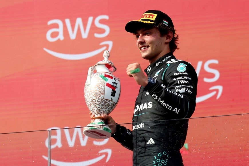 Formula One F1 - Hungarian Grand Prix - Hungaroring, Budapest, Hungary - July 26, 2026
Mercedes' Andrea Kimi Antonelli celebrates with a trophy on the podium after finishing third place in the Hungarian Grand Prix REUTERS/Bernadett Szabo